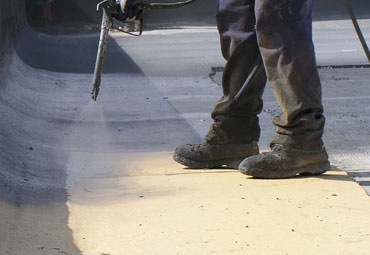 Coating systems over Eugene spray foam roof systems